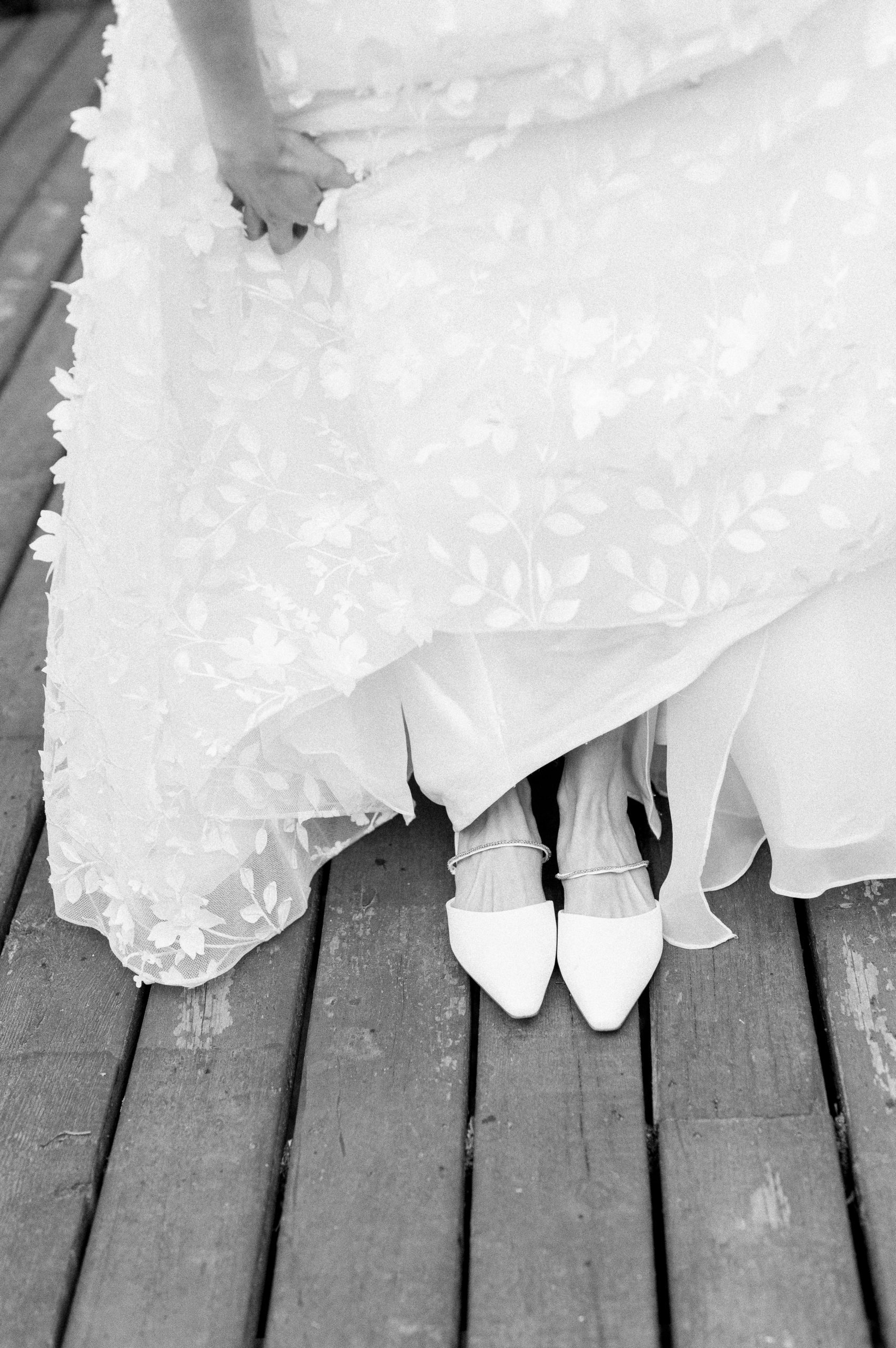 bride's shoes and dress detail