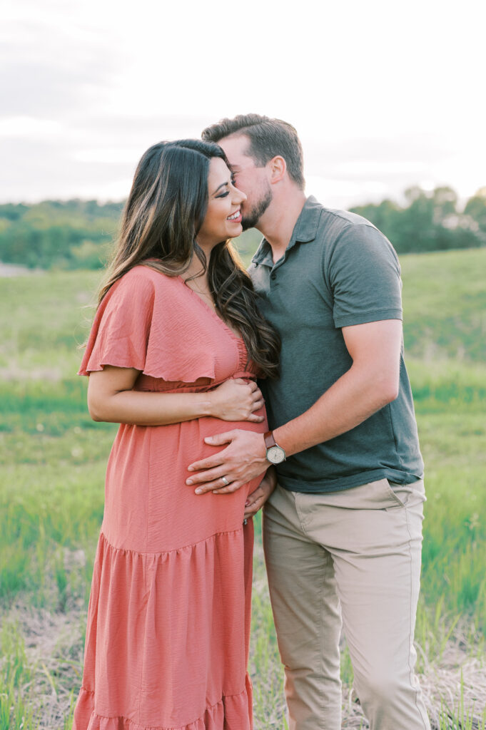 Minnesota summer maternity session couple standing together
