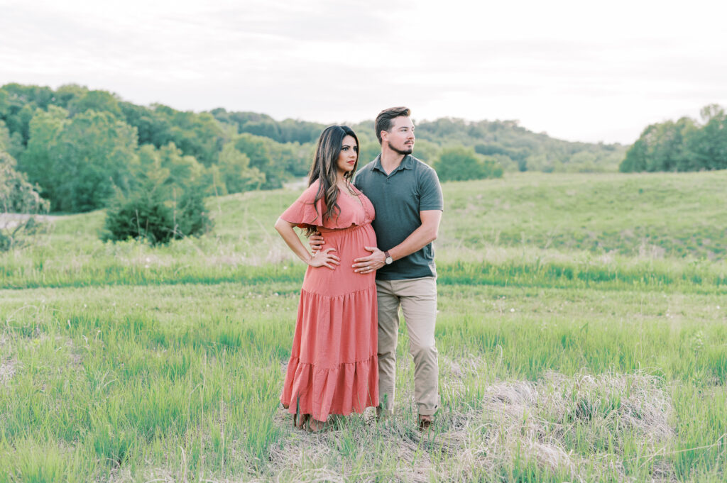 Minnesota summer maternity session couple standing together