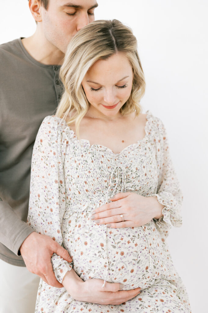 Mom and dad portrait at maternity session